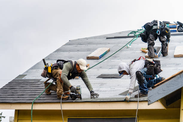 Professional Gutter Installation technician working in Pound Ridge, NY